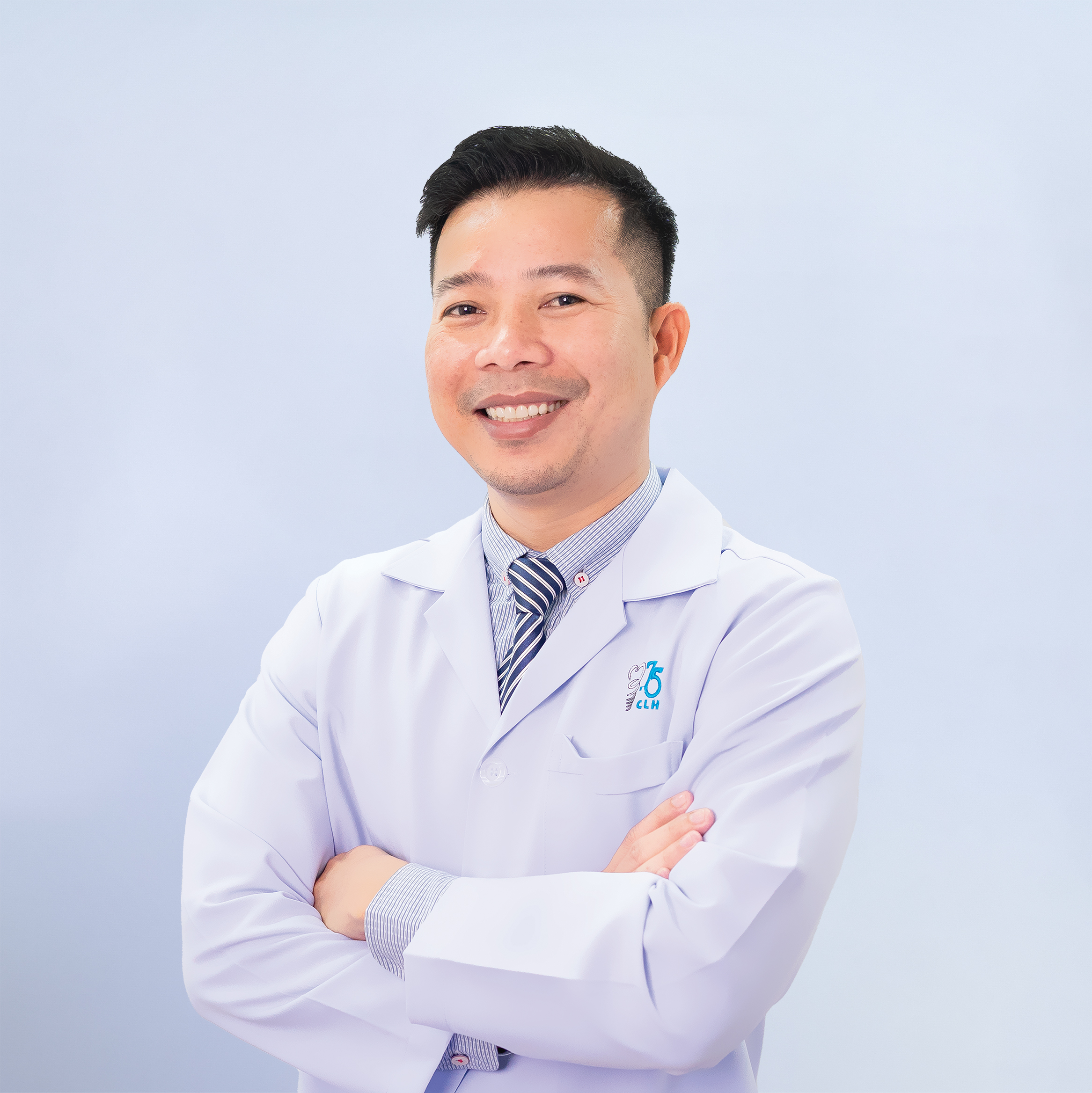 Dr. Vy Por, Specialist in Implant Surgery and General Dentistry, with additional training both domestically and internationally.